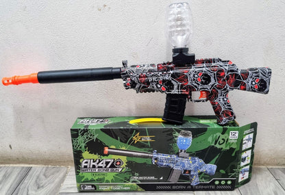 Graffiti-patterned AK47 style water bead blaster toy gun with orange tip and display box