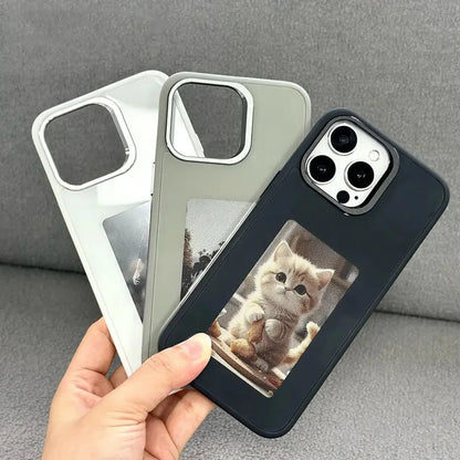 Hand holding three phone cases with card slots, one featuring a cute kitten design.