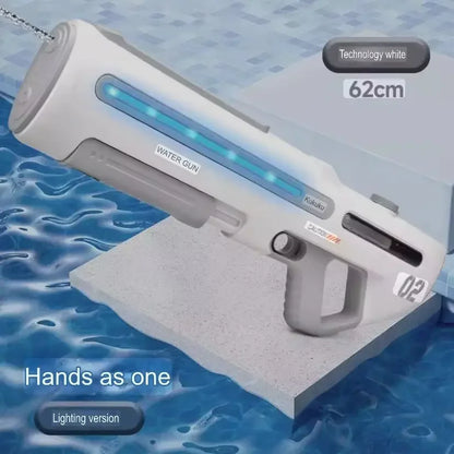 White 62cm LED water gun with blue detailing, displayed by a pool, shooting water.